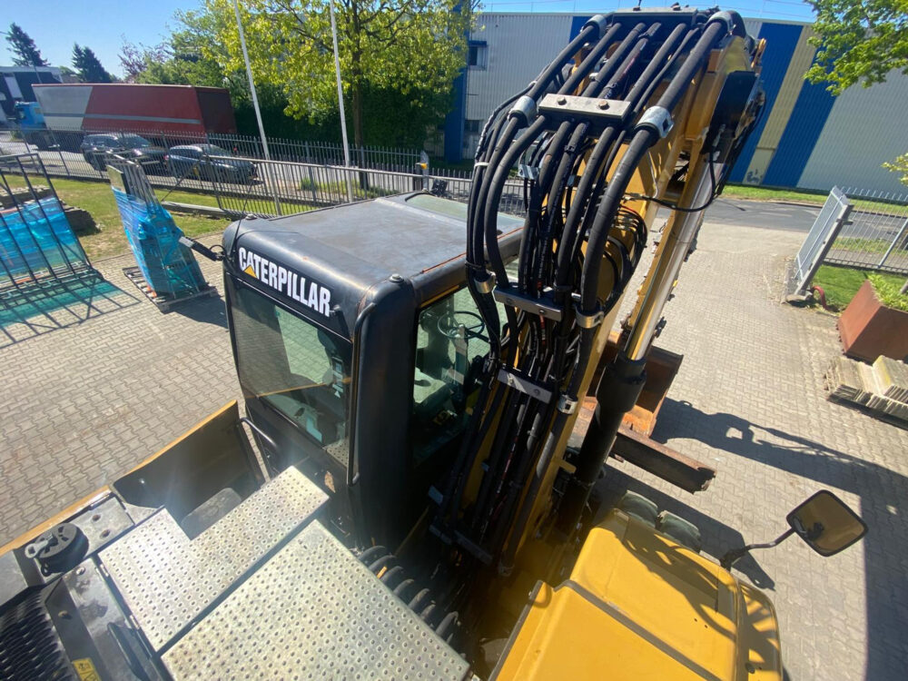Caterpillar M313D mobiele graafmachine