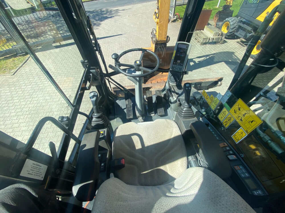 Caterpillar M313D mobiele graafmachine
